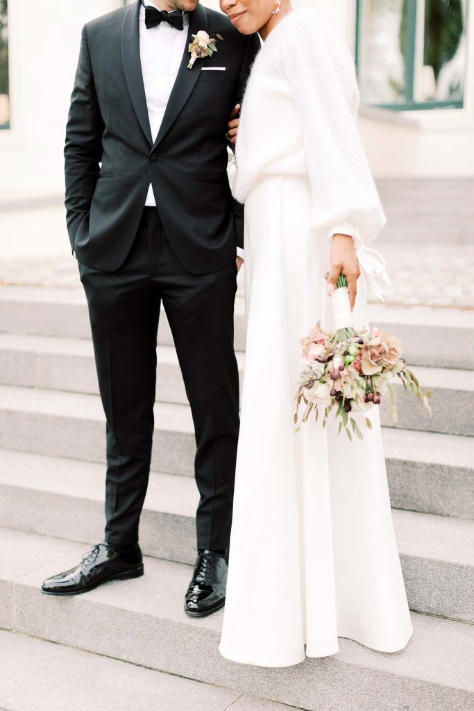 Hochzeitspaar heiratet im Weissenhaus Grand Village Resort